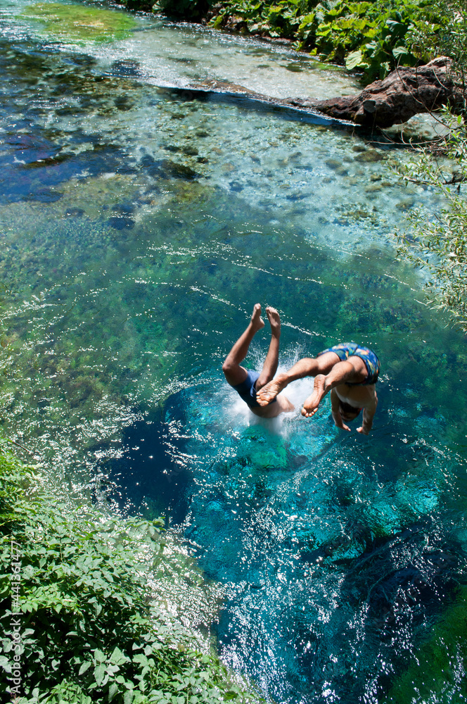 Children Diving into Karst Spring. Albania