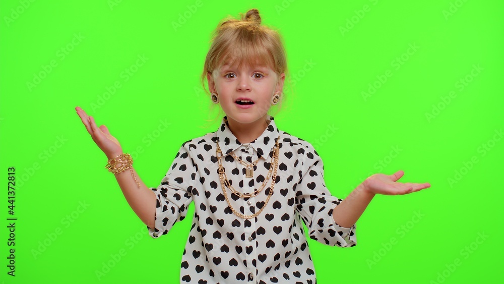 Oh my god, wow. Excited amazed blonde child girl 5-6 years old raising hands in surprise looking at camera with big eyes, shocked by sudden victory on chroma key green background. Teen kid children Oh my god, wow. Excited amazed blonde child girl 5-6 years old raising hands in surprise looking at camera with big eyes, shocked by sudden victory on chroma key green background. Teen kid children