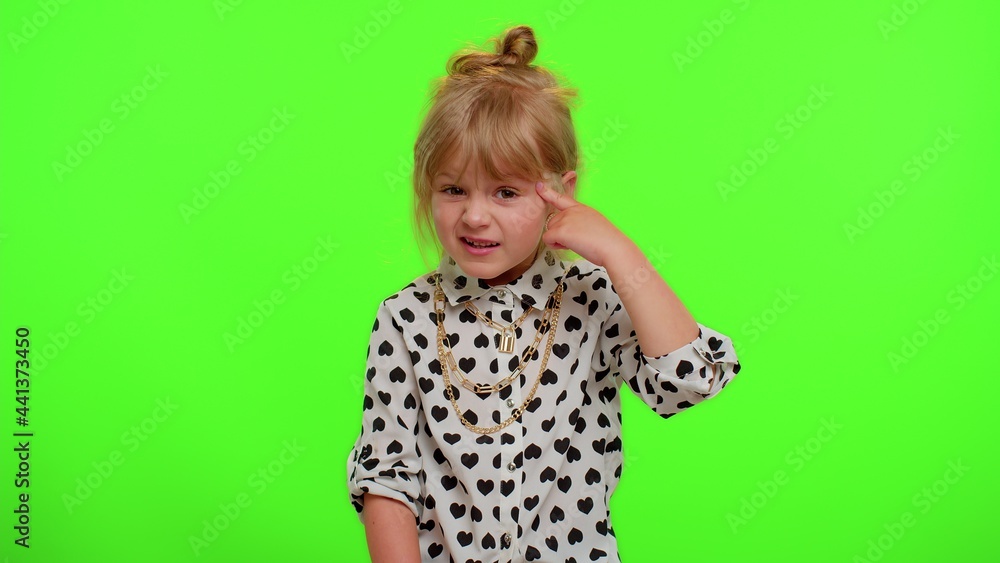 Are you crazy, out of mind. Funny blonde kid child 5-6 years old pointing at camera and showing stupid gesture, blaming some idiot for insane plan. Teenager children girl on chroma key wall background Are you crazy, out of mind. Funny blonde kid child 5-6 years old pointing at camera and showing stupid gesture, blaming some idiot for insane plan. Teenager children girl on chroma key wall background
