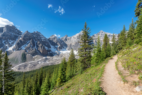 Scenic view of tourist hiking trail in sunny Canadian Rockies, Banff National Park, Canada.