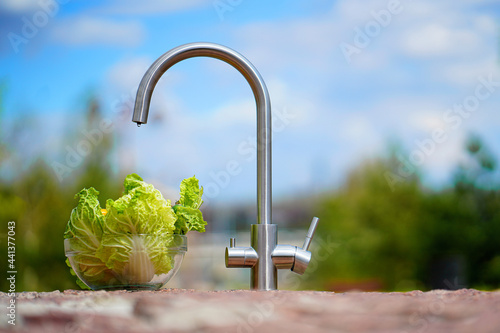 Mixer cold hot water. Modern faucet bathroom. Kitchen tap . Isolated white background. Chrome-plated metal.