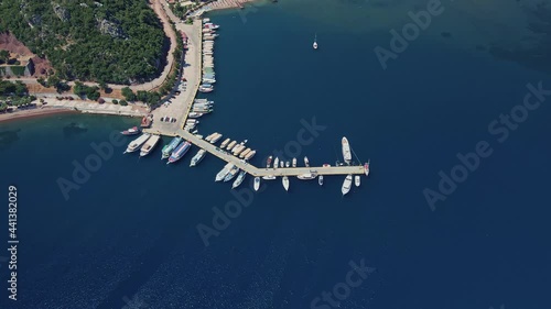 Top view of the pier with boats in the sea harbor