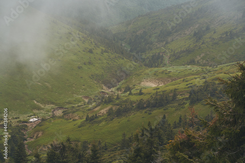 Low clouds and fog over the mountains. Svidovets ridge. Ukraine  Carpathian mountains.