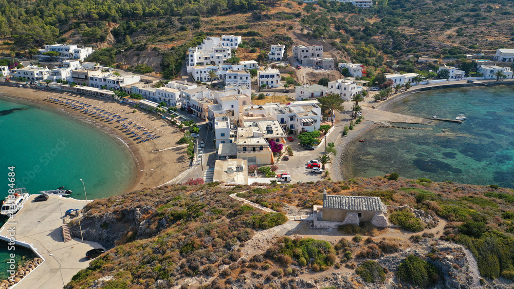 Aerial drone photo of beautiful twin bay, beach and small village of Kapsali  below iconic castle of Kythera island, Ionian, Greece