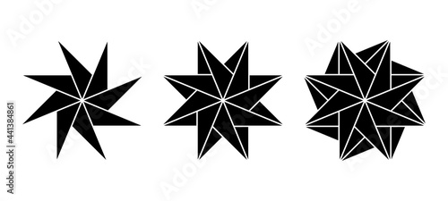 Pinwheel shaped eight-pointed stars made of triangles. Geometric patterns create the impression of rotation through symmetrical arrangement of triangles similar to curls of a spinning pinwheel. Vector