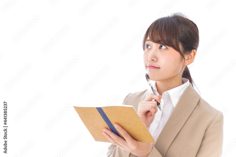 マスクを装着して悩む医師