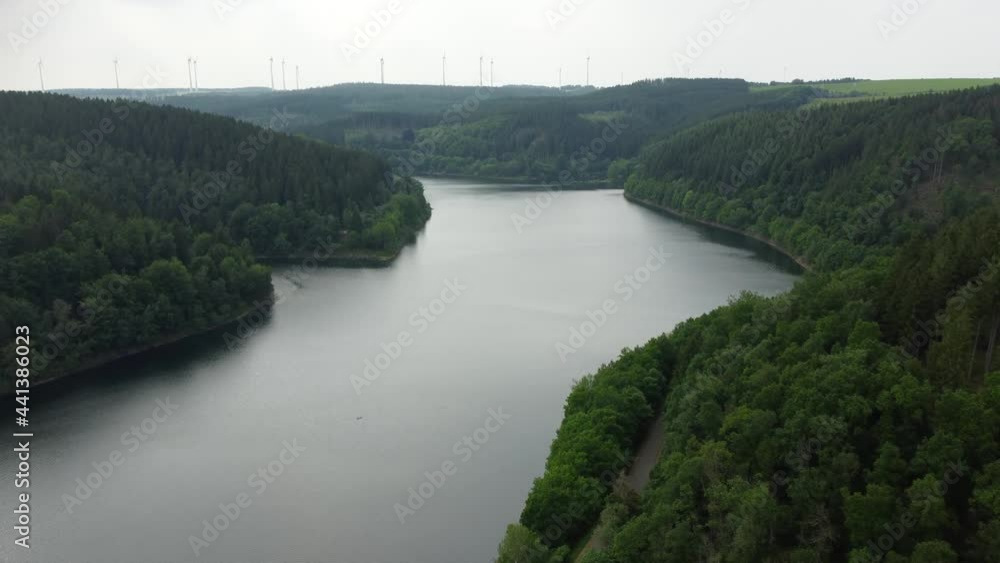Beautiful lake in the nature of Germany. Mountains and big river in Eifel National Park Beautiful lake in the nature of Germany. Mountains and big river in Eifel National Park