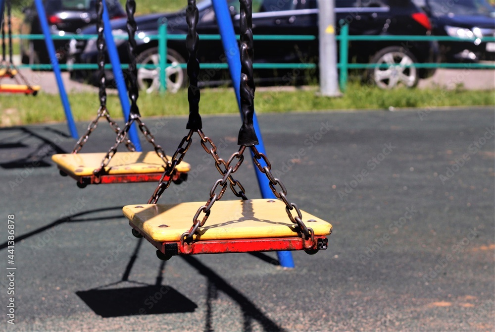 swing in the park children's playground street swing in the park children's playground street