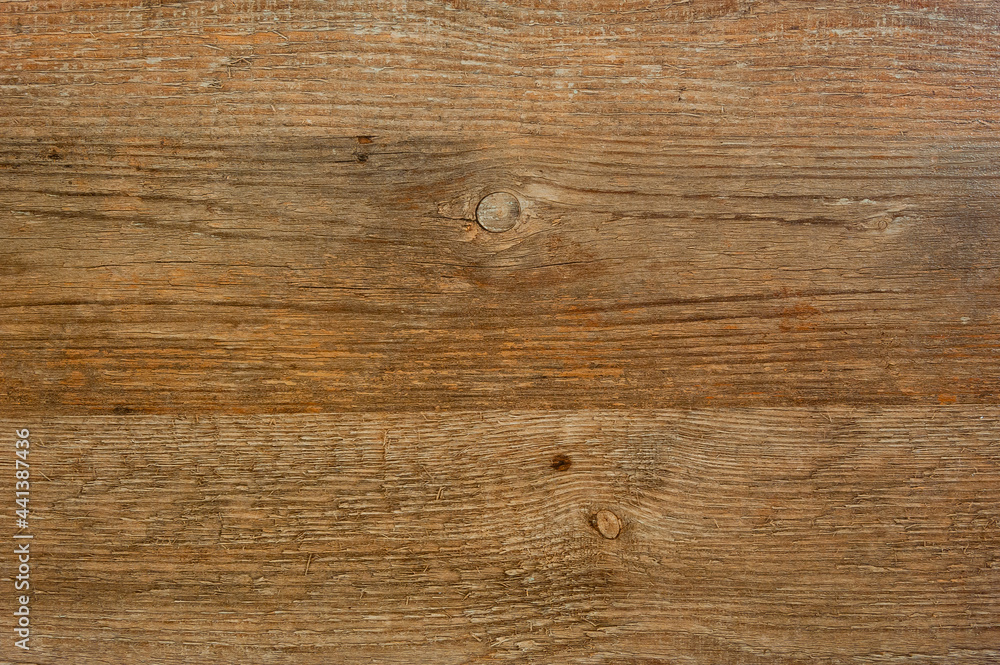 Naklejka premium The texture is a wooden wall made of planks.