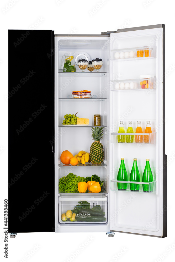 Open fridge full of fresh fruits and vegetables Open fridge full of fresh fruits and vegetables