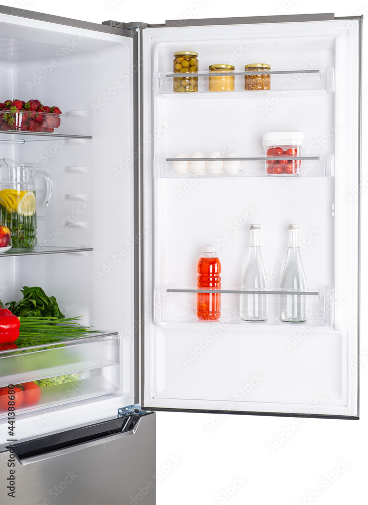 Open fridge full of fresh fruits and vegetables Open fridge full of fresh fruits and vegetables