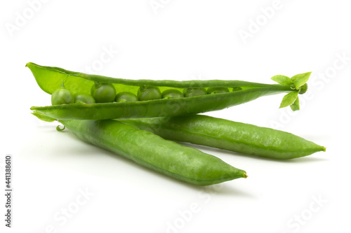 Isolated green pea pods on a white background. Beans in an open pod.