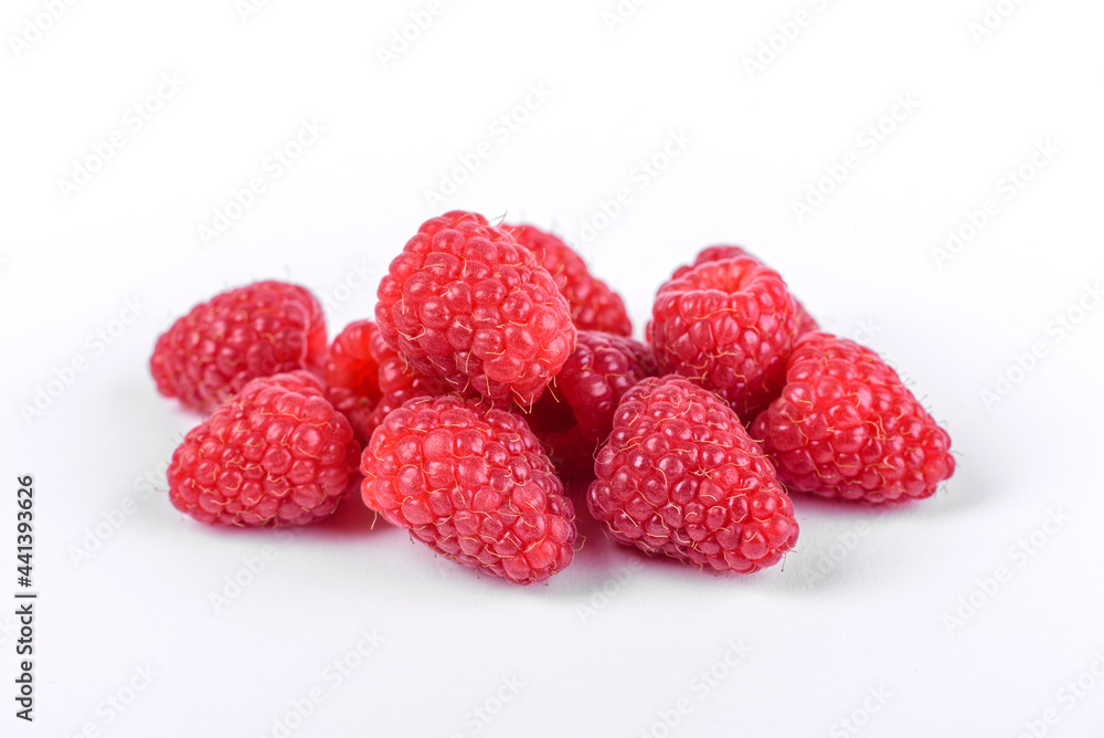 Ripe raspberries with raspberry leaf isolated on a white background Ripe raspberries with raspberry leaf isolated on a white background