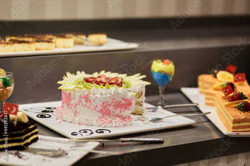 Turkish colorful desserts for picking up from buffet for hotel system of all-inclusive. Copy space