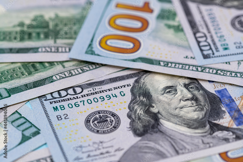 Close up of one hundred US dollar banknotes. Money background. Financial, business, investment and economical concept. Close up of one hundred US dollar banknotes. Money background. Financial, business, investment and economical concept.