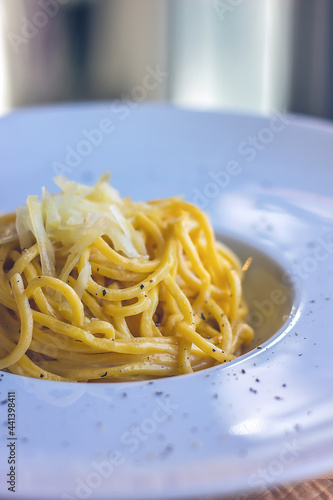 Spaghetti with pepper and cheese, cacio e pepe, tonnarelli, Italian pasta