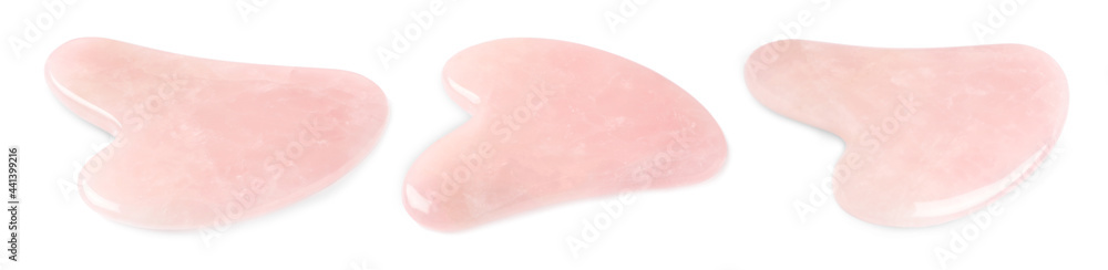 Rose quartz gua sha tools on white background, collage. Banner design Rose quartz gua sha tools on white background, collage. Banner design