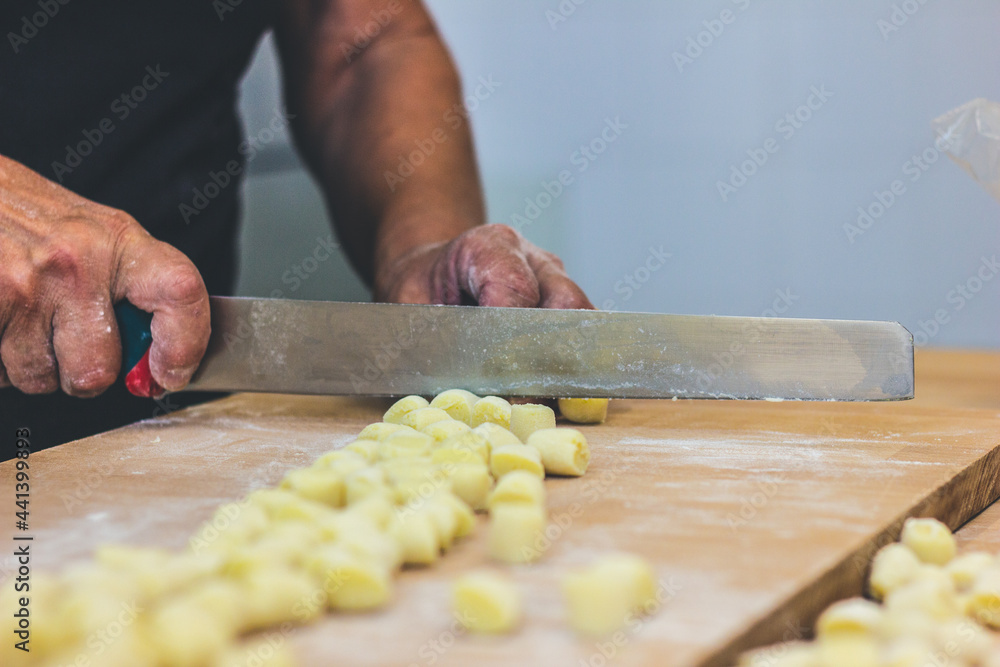 Potato gnocchi made by famale chef