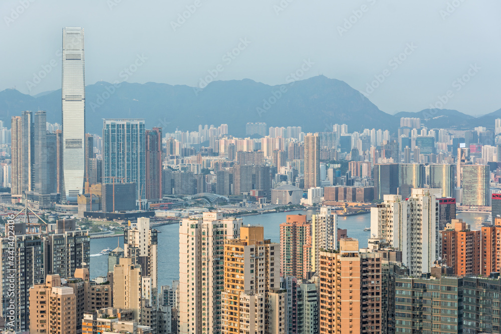 Skyline and skyscrapers of the city of Hong Kong in scenic evening light