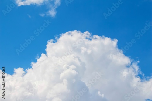 Cloudy blue sky background photo.