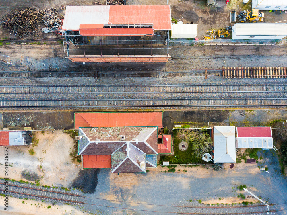 Aerial view of of a country railway station and surrounding sheds