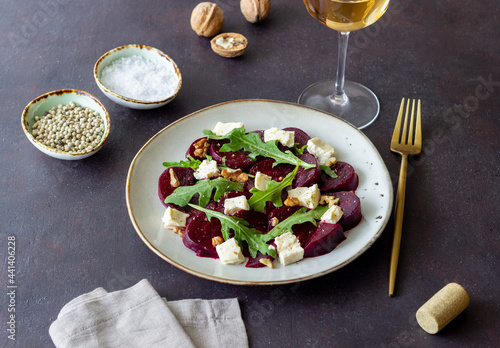 Beetroot salad with cheese, arugula, nuts and honey. Healthy eating. Vegetarian food.