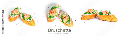 Bruschetta with cream cheese, shrimps cucumber and arugula leaves isolated on a white background. Toast isolated. Sandwich isolated. Sandwich with shrimps, salmon and cheese.