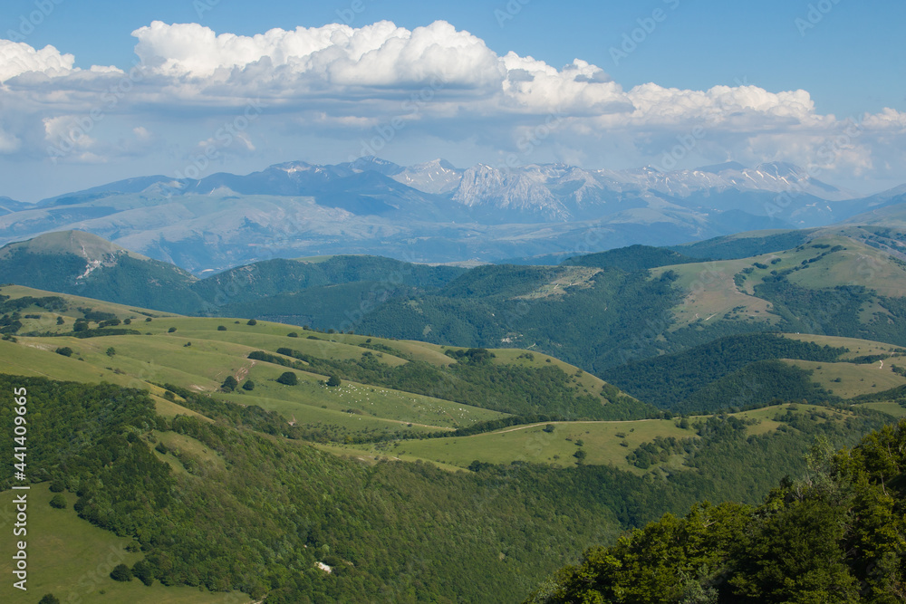 Panoramic view of the chain of Monti Sibillini in the marche region during spring day of sunny