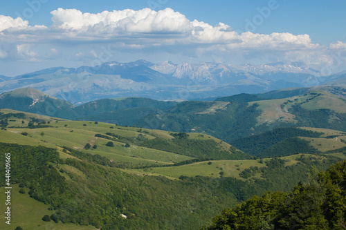 Panoramic view of the chain of Monti Sibillini in the marche region during spring day of sunny