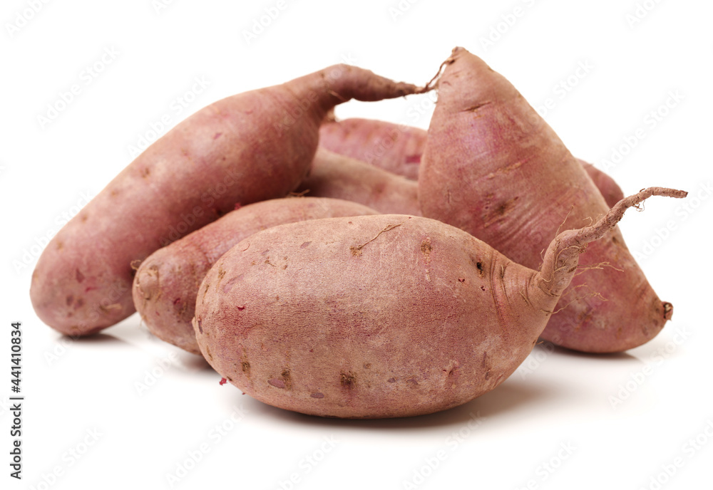 Purple Colored Sweet Potatoes on White background Purple Colored Sweet Potatoes on White background