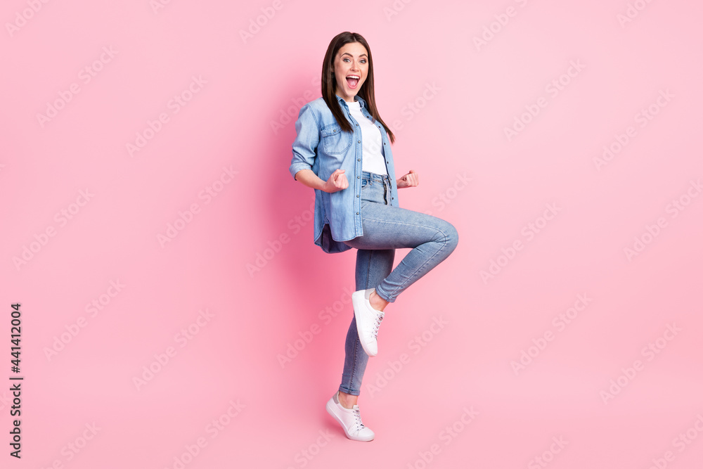 Full length body size view of attractive overjoyed cheerful girl rejoicing having fun isolated over pink pastel color background