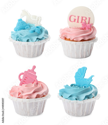 Set of decorated baby shower cupcakes with blue and pink cream on white background