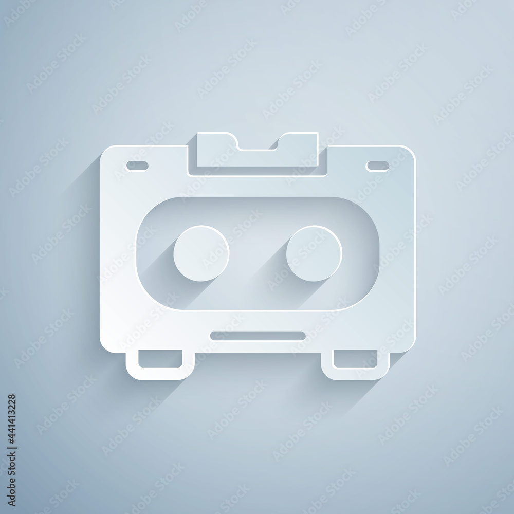 Paper cut Retro audio cassette tape icon isolated on grey background. Paper art style. Vector Paper cut Retro audio cassette tape icon isolated on grey background. Paper art style. Vector