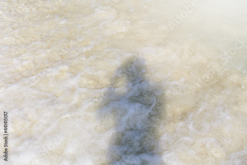 shadow of women wave and foam background