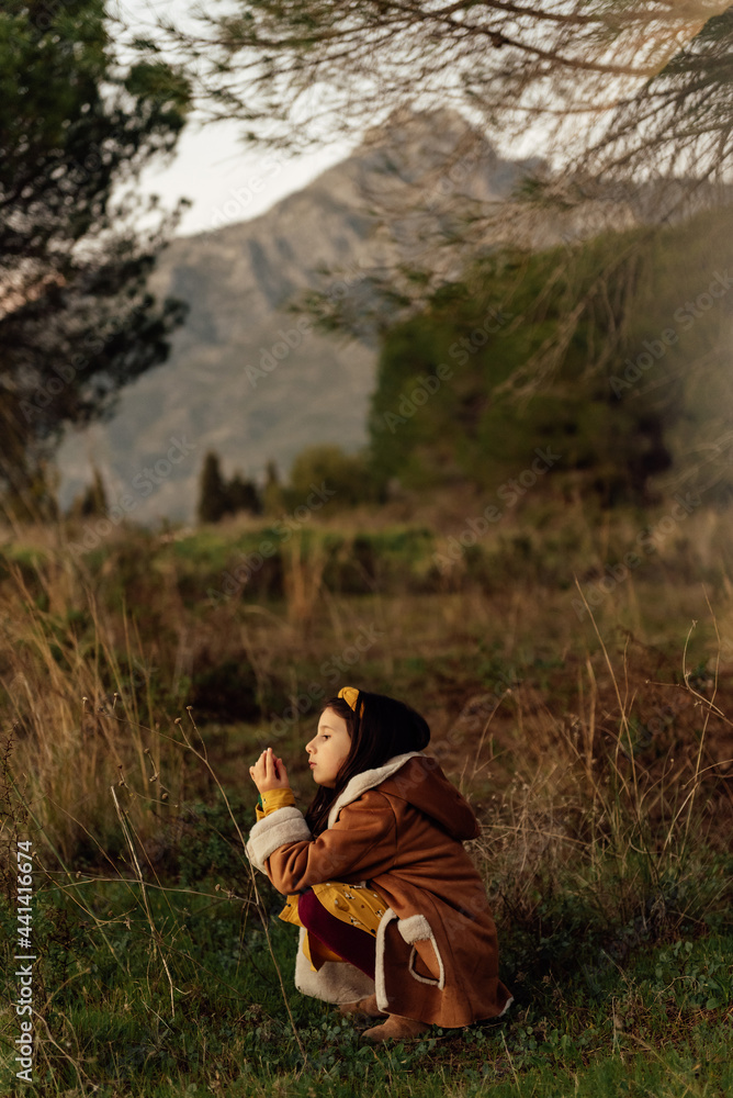 Little kid exploring nature in countryside Little kid exploring nature in countryside