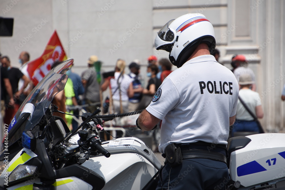 Close-up of a police officer and his motorbike Close-up of a police officer and his motorbike