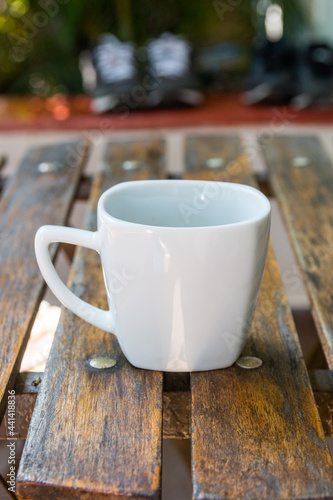 cup of coffee on a wooden table in Rio de Janeiro Brazil.