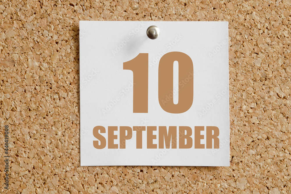 september 10. 10th day of the month, calendar date.White calendar sheet attached to brown cork board.Autumn month, day of the year concept september 10. 10th day of the month, calendar date.White calendar sheet attached to brown cork board.Autumn month, day of the year concept
