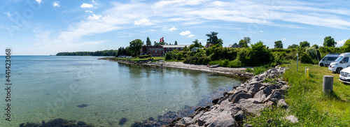 panorama of camper vans parked in a parking lot on the idyllic coast of Funen Island in southern Denmark