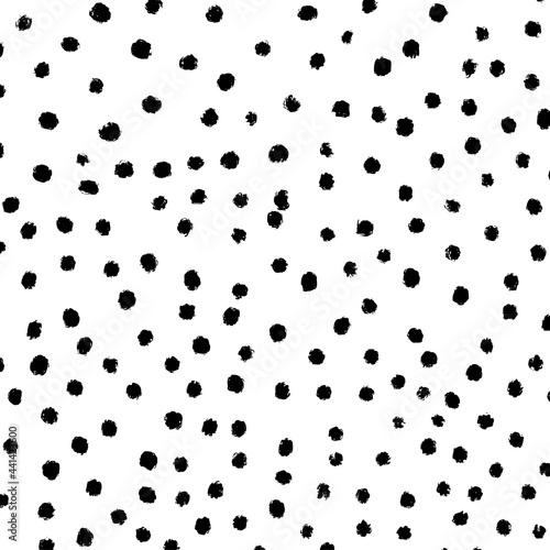 Black and white polka background. Hand drawn dot pattern design. Abstract illustration - vector