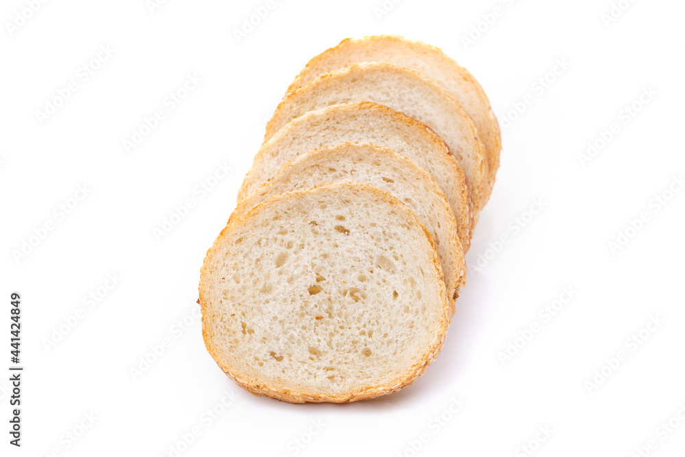 Slices of white bread or a loaf with sesame seeds isolated on a white background. Slices of white bread or a loaf with sesame seeds isolated on a white background.