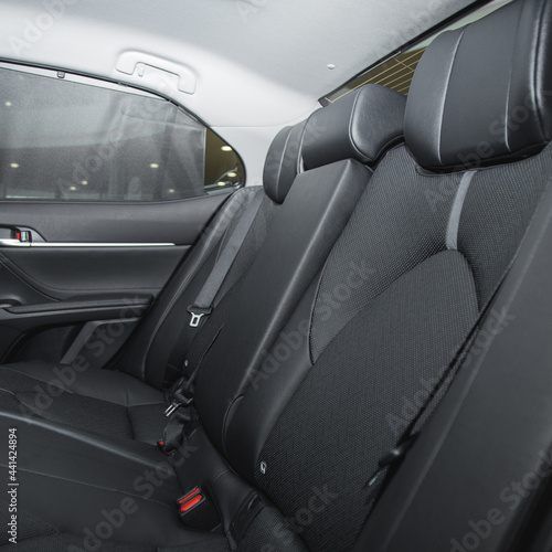 Back passenger seats in modern luxury car © Hanna