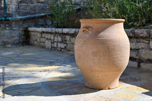 Typical Greek clay vase on the street photo