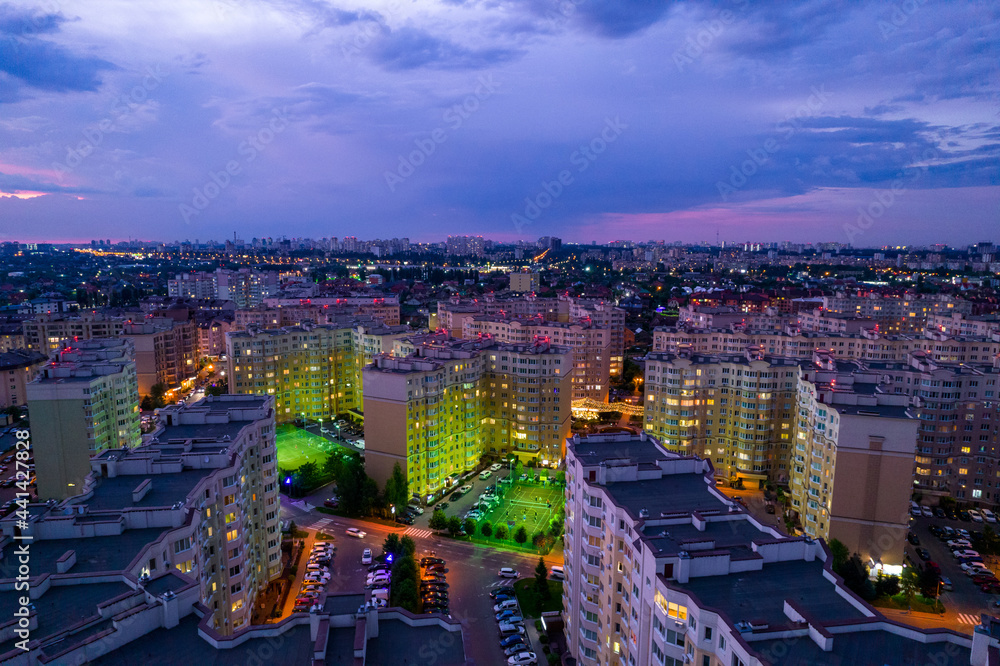 Fototapeta premium Aerial view of the city at sunset