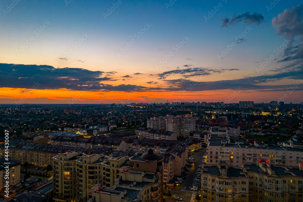 Fototapeta premium Aerial view of the city at sunset