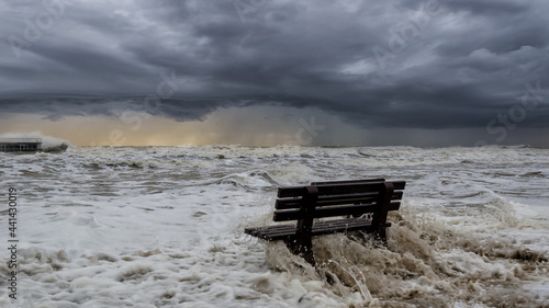 STORMY SEA - The benches on the seashore are flooded with foamy waves
