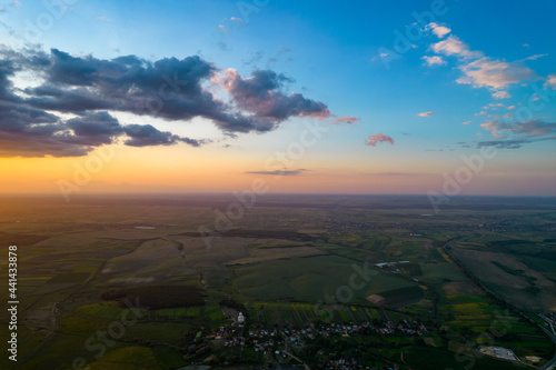 Aerial view of the sunset over the field