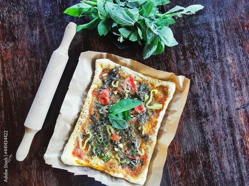 Vegan pizza with tomatoes and olive  photo