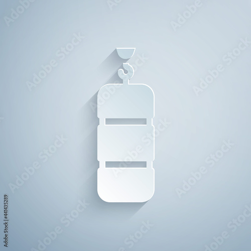 Paper cut Punching bag icon isolated on grey background. Paper art style. Vector