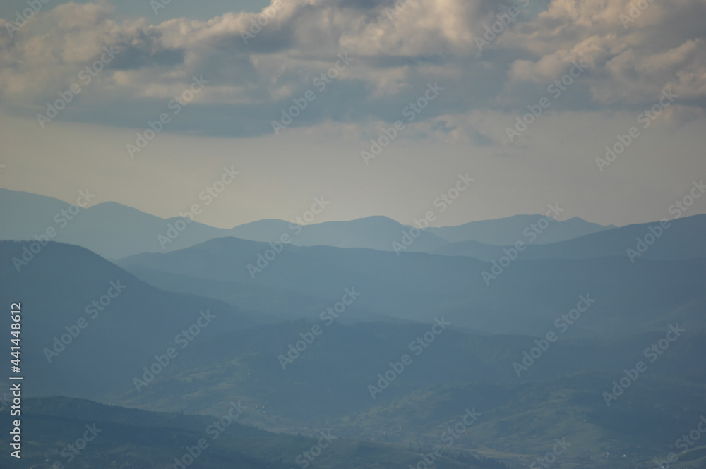 Fog on a mountain range in the Carpathian mountains